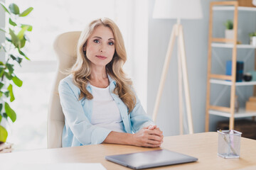 Sticker - Photo portrait strict confident business woman sitting at table working remotely from home