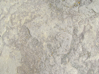 Texture of granite stone for backgrounds in the sun