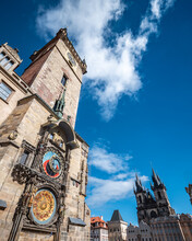 The Astronomical Clock, Prague, Czech Republic.Low, Wide Angle View Of The Famous Landmark With The Background Tyn Church In The Czech Capital.