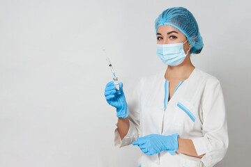 Wall Mural - Female doctor injecting injection vaccine, close-up