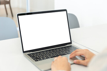 computer screen blank mockup.hand woman work using laptop with white background for advertising,contact business search information on desk at coffee shop.marketing and creative design