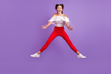 Poster - Photo of positive energetic lady jump hold hands empty space wear white blouse isolated violet color background