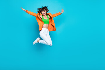 Sticker - Full body photo of nice millennial brunette lady jump wear cardigan top jeans sneakers isolated on teal background