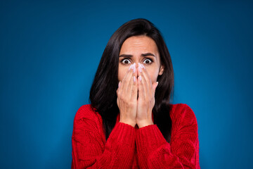 Sticker - Photo of pretty scared young woman dressed red pullover arms close lips nose face isolated dark blue color background