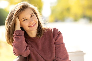 Wall Mural - Beautiful woman. Young girl portrait in nature in autumn. High quality photo