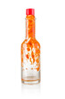 Bottle of used hot sauce isolated on white background