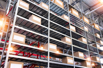 Fototapete - warehouse interior with cardboard boxes on shelves close up