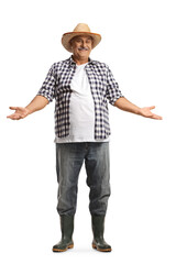 Wall Mural - Full length portrait of a smiling mature farmer with a straw hat gesturing with hands