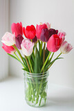 Fototapeta Tulipany - bouquet of pink tulips in mason jar