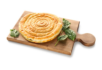 Wooden board with tasty spinach pie on white background