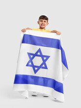 Little Boy With The Flag Of Israel On White Background