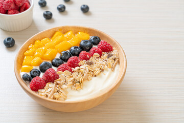 Wall Mural - homemade yogurt bowl with raspberry, blueberry, mango and granola