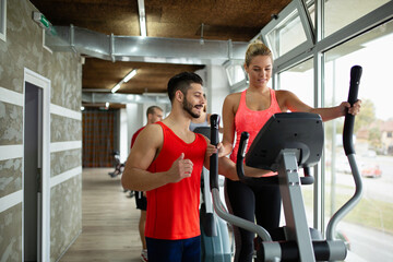 Poster - Personal trainer assisting woman to lose weight. Sport exercise people healthy lifestyle concept