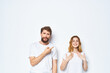 © SHOTPRIME STUDIO - man and woman in white t-shirts fashion posing
