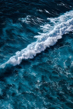 Aerial View To Seething Waves With Foam. Waves Of The Sea Meet Each Other During High Tide And Low Tide