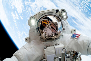 Wall Mural - astronaut isolated - elements of this image furnished by nasa
