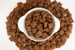 bowl with chocolate corn pads on sweet background, cereals breakfast