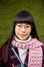 Portrait Smiling Beautiful Woman In Retro Eyeglasses And Pink Scarf