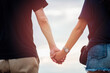 © Hide_Studio - couple holding hands together