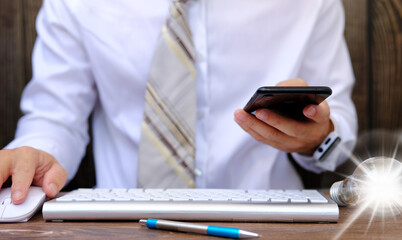 Poster - Businessman using smartphone and computer, worked from home, Home quarantine, New normal, technology business concept, freelance