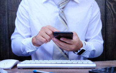 Sticker - A businessman types on a computer keyboard. Banking and strategy formulation A financial analyst is at work in the workplace. Accounting for businesses and project management