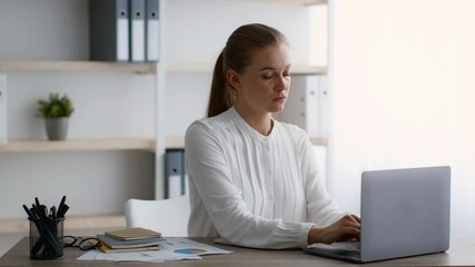 Poster - Young Businesswoman Working With Laptop Computer In Modern Office, Slow Motion Footage
