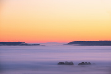 Wall Mural - Misty landscape view at dawn