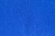 Blue felt fabric. Blue felt texture. Blue blank surface.