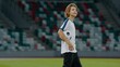 © supamotion - Portarit of Caucasian pre teen kid boy entering the field of huge soccer stadium, holding a ball, dreaming of becoming professional player, soccer star