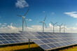 © Peter Adams - Wind turbine and solar panels energy generators on wind farm