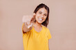 © carlesmiro - Smiling woman point finger at you, positive mood.