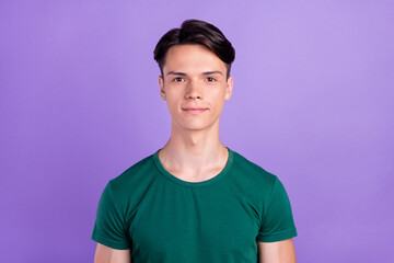 Poster - Photo of young charming attractive man wear green t-shirt casual style isolated on purple color background