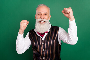 Sticker - Photo of astonished retired man celebrate successful victory wear striped waistcoat on green color background