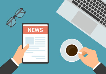 Poster - Flat design top view of office workspace. Hands of manager holding tablet with newspaper, cup of coffee and laptop, vector