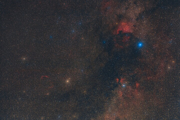 Wall Mural - Bright stars, the Milky Way, and nebulae in the constellation cygnus photographed from Mannheim in Germany.
