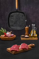 Wall Mural - Raw lamb steak on kitchen table