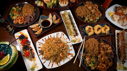 Wall Mural - Top view of a rich table with traditional Asian food