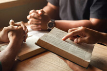 Young Man Reading Bible With Friends Who Are Praying To God Join The Cell Group At The Church. A Small Group Of Christians Or Concepts In A Church At A Church.