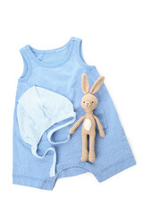 Wall Mural - Baby clothes and toy rabbit isolated on white background