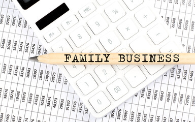Poster - text FAMILY BUSINESS on wooden pencil on the calculator with chart