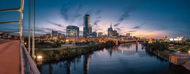 Wall Mural - nashville skyline during blue hour with river front