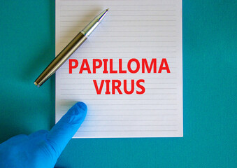 Papilloma virus symbol. White note with words Papilloma virus, beautiful blue background, doctor hand in blu glove and metallic pen. Medical and papilloma virus concept.