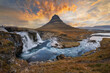 Fantastic picturesque sunset over Majestic Kirkjufell and waterfalls