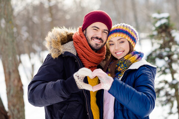 Poster - Portrait of handsome guy attractive lady hands fingers together show heart symbol wear gloves free time outdoors