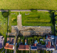 An Aerial View Over The Ruins Of A Roman Fort In A Field Outside Piercebridge, UK In Summertime