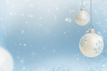 Wall Mural - white christmas balls with snowflakes on a blurry background with particles