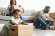 © Prostock-studio - Happy African American family relocating to new apartment