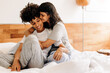 © (JLco) Julia Amaral - Young lesbian couple being romantic at home