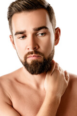 Wall Mural - Young and handsome bearded man with smooth skin