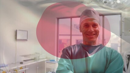 Sticker - Animation of flag of japan waving over surgeons in operating theatre